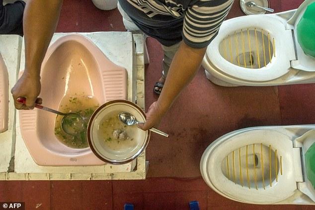 Hotel Serving Food In Latrines