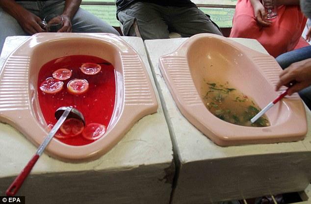 Hotel Serving Food In Latrines