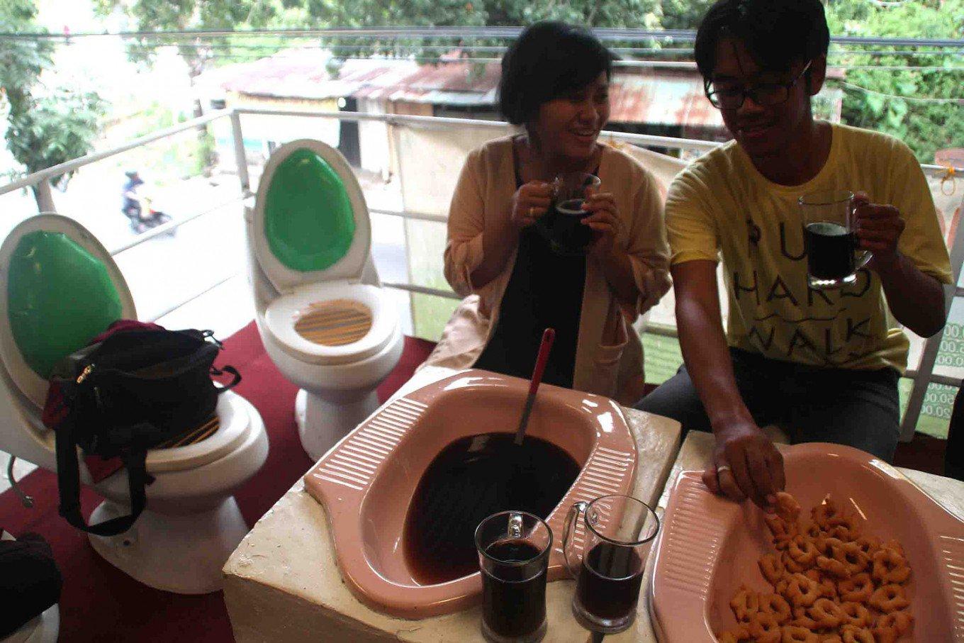 Hotel Serving Food In Latrines