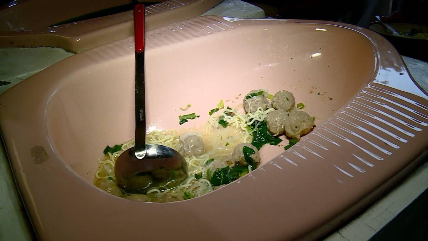 Hotel Serving Food In Latrines